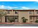 Charming townhome featuring a desert landscape, private entrances, and classic architectural details at 10631 N 15Th Way # 4, Phoenix, AZ 85020