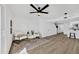 Stylish living area with accent rug, comfortable seating, and view of kitchen at 10631 N 15Th Way # 4, Phoenix, AZ 85020