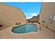 Community pool, desert landscaping, with mountains in the background at 10631 N 15Th Way # 4, Phoenix, AZ 85020