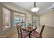 Cozy dining area with pond view at 10913 W Chino Dr, Peoria, AZ 85373