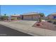 Inviting home with a well-manicured yard and convenient three-car garage, offering both charm and functionality at 10913 W Chino Dr, Peoria, AZ 85373