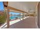 Spacious covered patio overlooking a serene waterfront view, perfect for outdoor relaxation and entertainment at 10913 W Chino Dr, Peoria, AZ 85373
