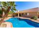 Stunning backyard pool and spa with mature landscaping and plenty of space for entertaining at 1182 E Harrison St, Gilbert, AZ 85295