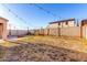 Spacious backyard with block wall, ready for landscaping and outdoor entertaining at 12056 W Melinda Ln, Sun City, AZ 85373