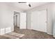 Bedroom featuring carpet flooring, a ceiling fan, and a closet at 12056 W Melinda Ln, Sun City, AZ 85373