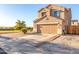 Attractive two-story home with desert landscaping, two car garage and tile roof at 12056 W Melinda Ln, Sun City, AZ 85373