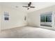Large bedroom with neutral carpet, fan, recessed lighting, and multiple windows offering natural light at 1331 E La Mirada Dr, Phoenix, AZ 85042