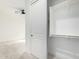 Bright bedroom featuring a closet with shelving for ample storage space at 1331 E La Mirada Dr, Phoenix, AZ 85042