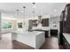 The spacious kitchen is equipped with stainless steel appliances and an island at 1331 E La Mirada Dr, Phoenix, AZ 85042