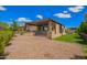 Backyard featuring rock landscaping, a covered patio with a built-in grill at 1331 E La Mirada Dr, Phoenix, AZ 85042