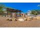 Community park featuring a shaded outdoor pavilion and a rock and tree stump play area at 1331 E La Mirada Dr, Phoenix, AZ 85042