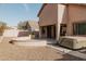 Enjoy this backyard oasis with a spa and outdoor grill at 13542 W Port Au Prince Ln, Surprise, AZ 85379