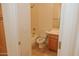 Bathroom featuring a shower/tub combo, toilet, and a vanity sink at 13542 W Port Au Prince Ln, Surprise, AZ 85379