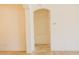 Neutral hallway featuring clean lines and easy access to other rooms in the home at 13542 W Port Au Prince Ln, Surprise, AZ 85379