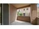 Outdoor balcony featuring block wall and a view of the neighborhood at 1411 E Orangewood Ave # 123, Phoenix, AZ 85020