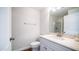 Bathroom featuring vanity with sink, toilet and a separate shower with a glass door at 1411 E Orangewood Ave # 123, Phoenix, AZ 85020