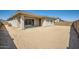 Spacious backyard ready for landscaping and outdoor enjoyment at 15005 W Gray Fox Trl, Surprise, AZ 85387