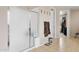 The bathroom is equipped with a glass shower and a view to the closet at 15658 W Cortez St, Surprise, AZ 85379