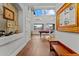 Bright living room with hardwood floors, high ceilings, and a pool table at 16533 W Carmen Dr, Surprise, AZ 85388