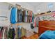 Organized walk-in closet with ample hanging space and storage, including a dresser at 16533 W Carmen Dr, Surprise, AZ 85388