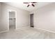 Comfortable bedroom with a view of a walk-in closet at 16771 W Adams St, Goodyear, AZ 85338