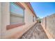 The side of the house features a private yard, ready for your customization and enjoyment at 17008 W Sonora St, Goodyear, AZ 85338