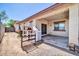 Exterior view of the backyard featuring a small dog house and a covered patio off the main house at 17008 W Sonora St, Goodyear, AZ 85338