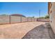 Spacious backyard features a block wall, providing privacy and security at 17008 W Sonora St, Goodyear, AZ 85338
