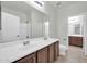 Bathroom with double sink vanity offers storage and ample counter space at 17008 W Sonora St, Goodyear, AZ 85338