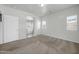 Spacious bedroom with ensuite bathroom access offers comfortable living at 17008 W Sonora St, Goodyear, AZ 85338