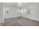 Bright bedroom with multiple windows providing plenty of natural light at 17008 W Sonora St, Goodyear, AZ 85338