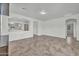Open living area features tile flooring and arched doorways, ideal for entertaining at 17008 W Sonora St, Goodyear, AZ 85338