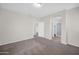 Bright main bedroom with neutral walls and flooring and ensuite bathroom at 17008 W Sonora St, Goodyear, AZ 85338