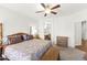 Comfortable main bedroom with a view of the ensuite bathroom at 18137 N Plaza Ct, Surprise, AZ 85374