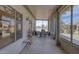 The covered patio offers an outdoor retreat with seating, ideal for relaxation and entertaining at 18137 N Plaza Ct, Surprise, AZ 85374