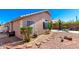 Private backyard features low-maintenance landscaping, rock garden, brick-lined pathway, and outdoor seating at 18850 N 16Th Pl, Phoenix, AZ 85024