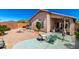 Charming backyard with a rock garden, manicured landscaping, and cozy seating areas at 18850 N 16Th Pl, Phoenix, AZ 85024