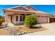 Charming single-story home featuring a low-maintenance yard and a cozy covered porch at 18850 N 16Th Pl, Phoenix, AZ 85024