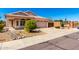 Beautiful home with desert landscaping, spacious driveway, and private fenced yard at 18850 N 16Th Pl, Phoenix, AZ 85024