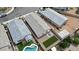 Aerial view of homes featuring backyard layouts, landscaping, and outdoor living spaces at 1924 S 82Nd Cir, Mesa, AZ 85209