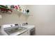 Laundry room featuring front loading washer and dryer, plus built-in shelving at 1924 S 82Nd Cir, Mesa, AZ 85209