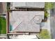 A bird's-eye view of the home's roof and backyard with a private pool and patio at 2169 N 212Th Ln, Buckeye, AZ 85396