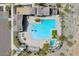 Overhead view of the neighborhood pool area including a diving area, lounge chairs, playground and more at 2169 N 212Th Ln, Buckeye, AZ 85396