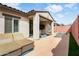 Gorgeous backyard with patio, lounge chairs and swimming pool, perfect for relaxation and outdoor fun at 2169 N 212Th Ln, Buckeye, AZ 85396