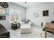 Cozy room featuring bright natural light and a chair perfect for lounging at 2169 N 212Th Ln, Buckeye, AZ 85396