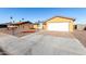 Charming single-story home with a two-car garage and low maintenance desert landscaping at 2581 E Commonwealth Cir, Chandler, AZ 85225