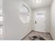 Bright entry foyer featuring tile flooring and natural light from a decorative front door at 2581 E Commonwealth Cir, Chandler, AZ 85225