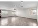 Spacious living room featuring tile flooring, recessed lighting, and lots of natural light at 2581 E Commonwealth Cir, Chandler, AZ 85225