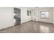 Bright living room with tile flooring, and access to the rest of the house at 2581 E Commonwealth Cir, Chandler, AZ 85225