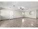 Spacious living room featuring tile flooring, recessed lighting, and neutral paint at 2581 E Commonwealth Cir, Chandler, AZ 85225